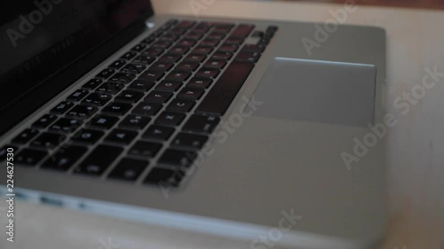 Wallpaper Mural Computer laptop keyboard use in slow motion Torontodigital.ca