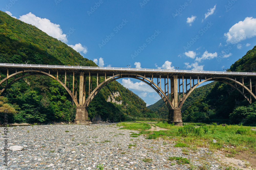 Stone bridge over gorge of river Gumista, Abkhazia Stone bridge over gorge of river Gumista, Abkhazia