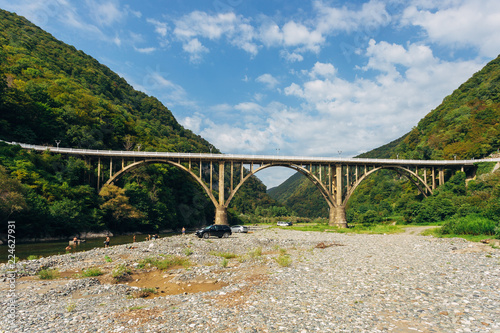 Stone bridge over gorge of river Gumista, Abkhazia photo