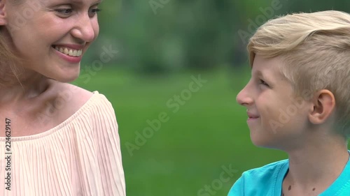 Son and mum nuzzling, love each other, single mother happy with beloved child
