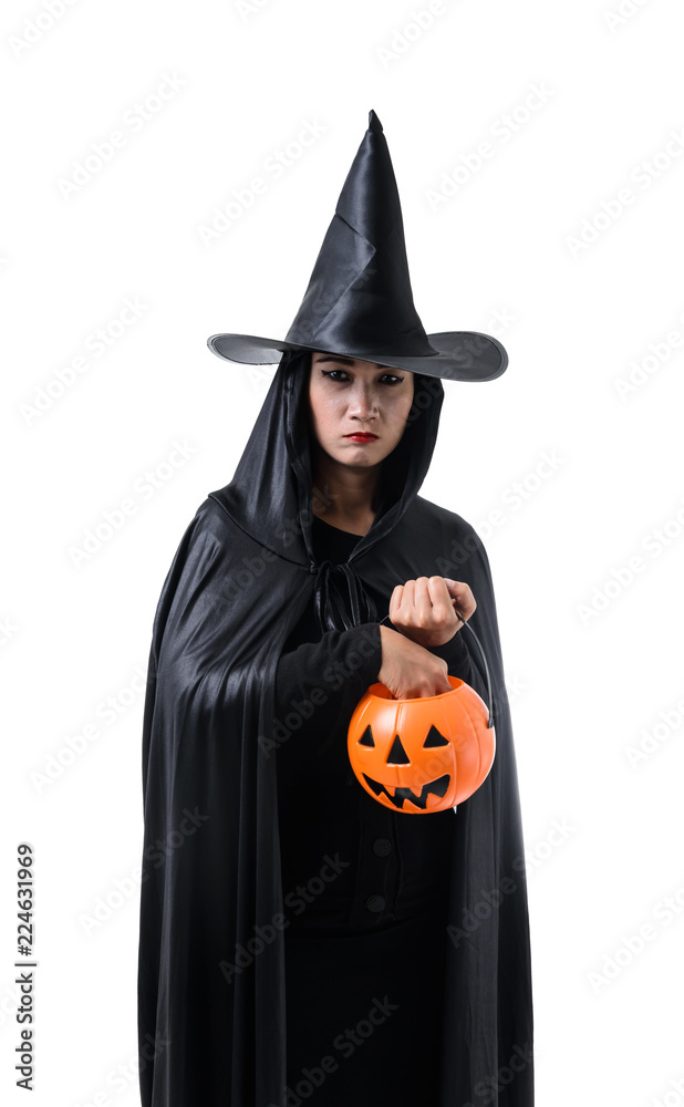 Fototapeta premium Portrait of woman in black Scary witch halloween costume standing with hat isolated on white background