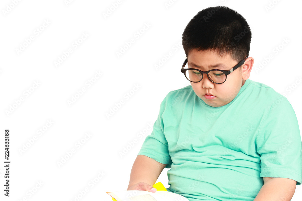 Asian white fat boy wearing glasses reading white background.. Stock Photo  | Adobe Stock