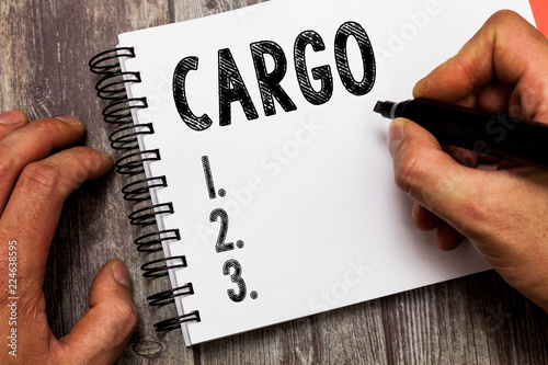 Text sign showing Cargo. Conceptual photo The goods Merchandise conveyed in a ship airplane and vehicle.