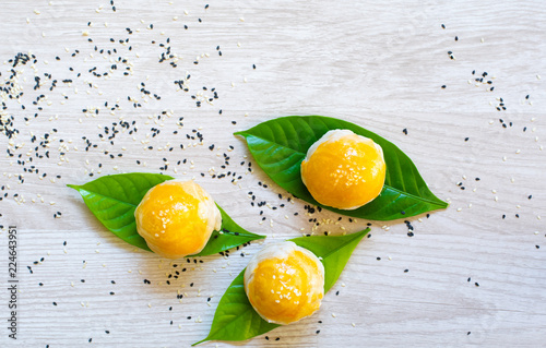 Fotografija Chinese pastry or Traditional Thai cake with leaf on table background top dow vi