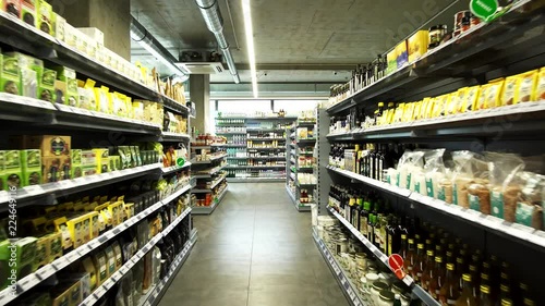 Grocery store shelves of Bio Line superfoods market, with consumer processed foods decked up