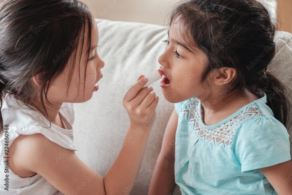 young multicultural kids doing make up pretend play young multicultural kids doing make up pretend play