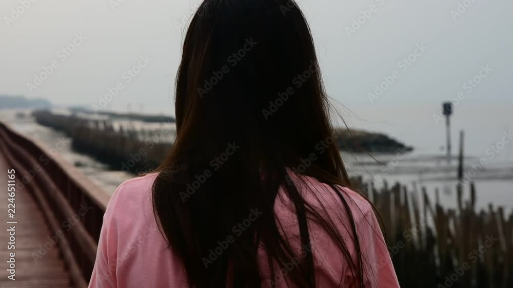Women holding smartphone and using phone take photo travel on morning sunlight Women holding smartphone and using phone take photo travel on morning sunlight
