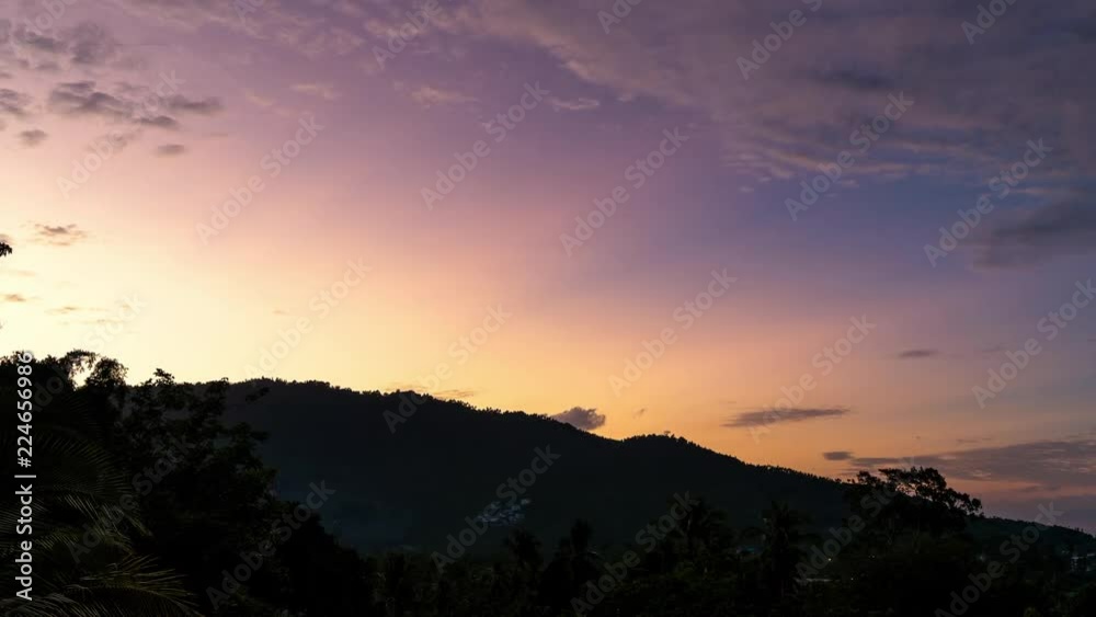 Colourful cloud sky against the backdrop of mountains at sunset on a tropical island. 4k time lapse
Colourful cloud sky against the backdrop of mountains at sunset on a tropical island. 4k time lapse