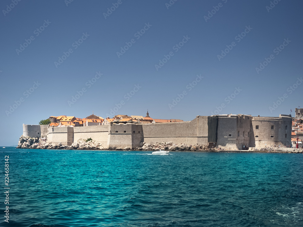 View of Dubrovnik old town during a boat tour in a sunny summer day. Dubrovnik, Croatia