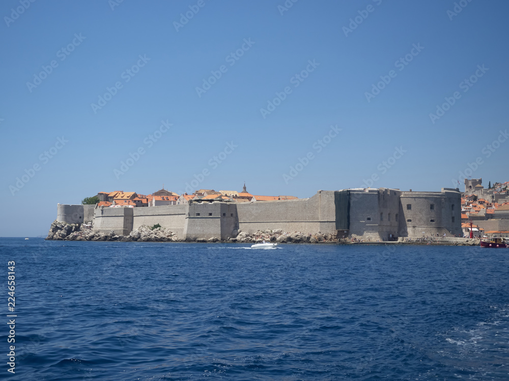 View of Dubrovnik old town during a boat tour in a sunny summer day. Dubrovnik, Croatia