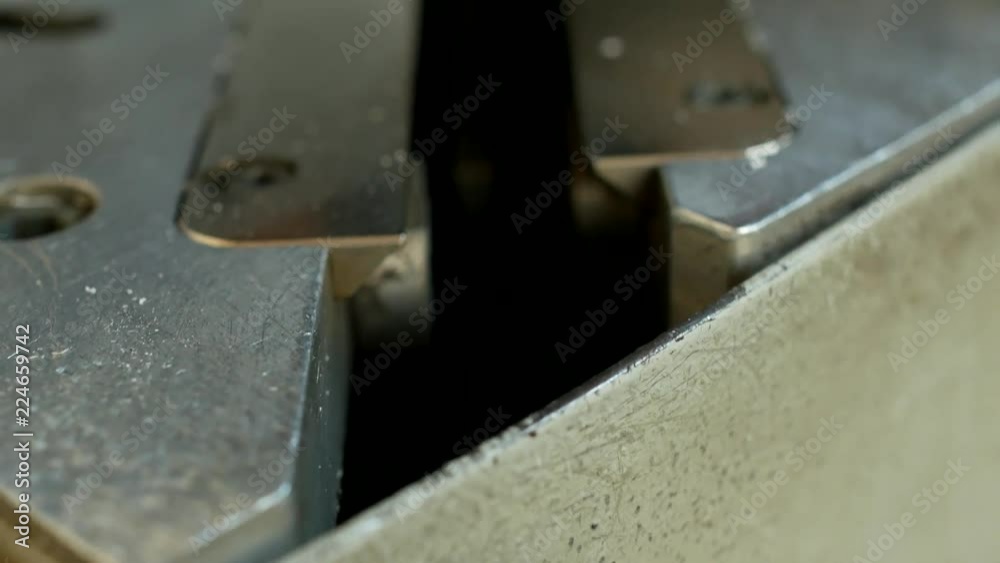 Production of pvc windows, machine for gluing the corners of the pvc profile window, close-up, bench soldering Production of pvc windows, machine for gluing the corners of the pvc profile window, close-up, bench soldering