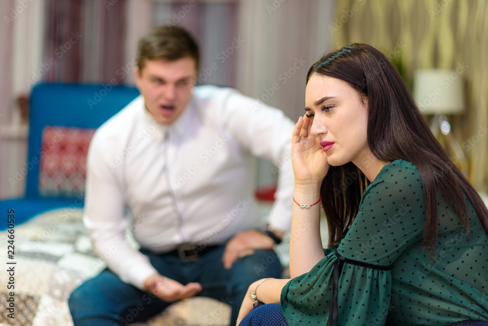 Naklejka premium Family relations, problems, family conflict between husband and wife.