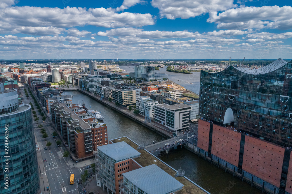 Fototapeta premium Aerial view of amazing port of Hamburg, Germany. Boats, ships and beautiful buildings.