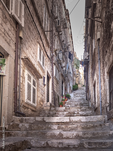 Old street with characteristics staires in Dubrovnik Old Town city centre, Croatia photo