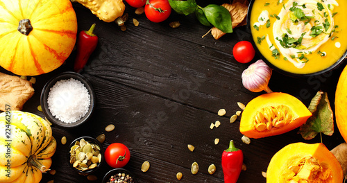 From above view of colorful vegetables laid in circle on wooden background 
