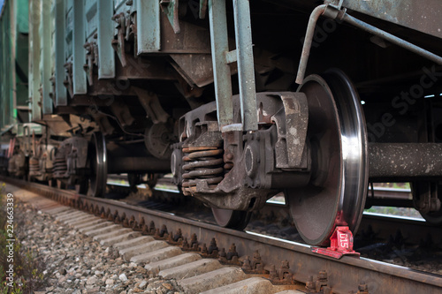 red railway brake shoe stops the train