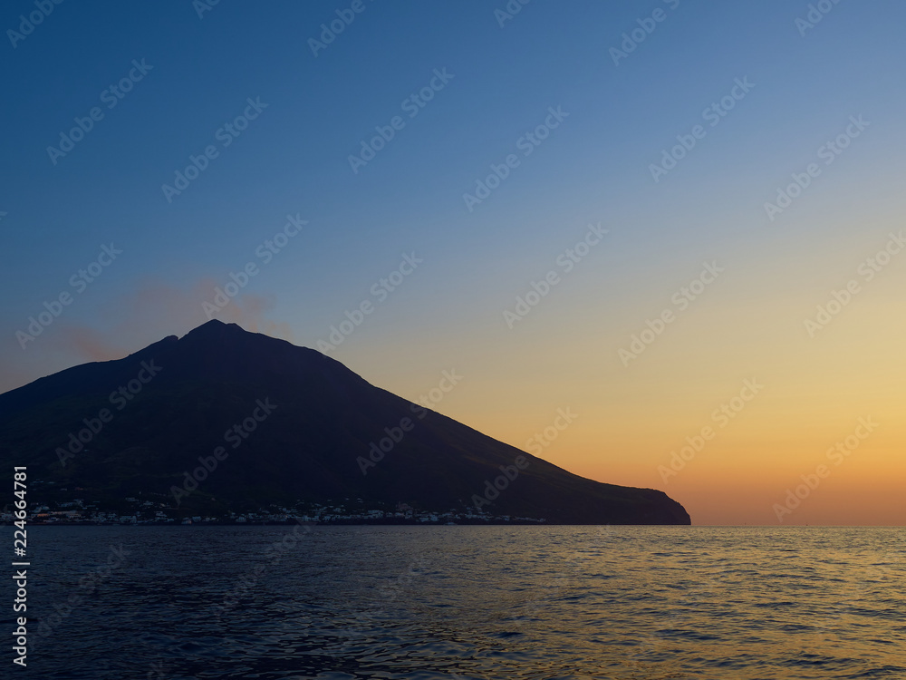 Shooting the volcano at sunset from the boat Shooting the volcano at sunset from the boat