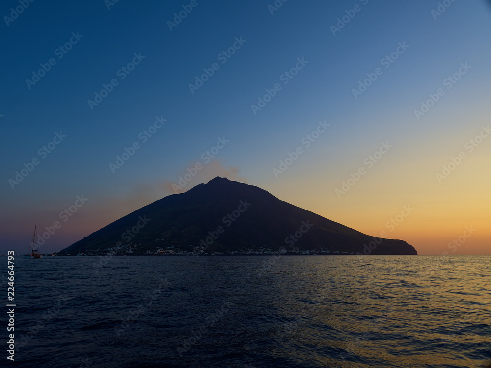 Shooting the volcano at sunset from the boat Shooting the volcano at sunset from the boat