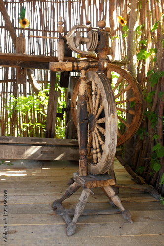 Old distaff. Spinning wheel. Device for making yarns. Vintage distaff in museum of antiquities