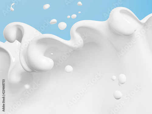 Milk drops and splashes isolated on blue background