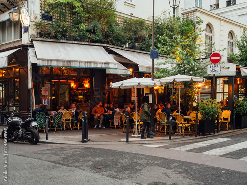 Cozy street with tables of cafe in Paris, France © Ekaterina Belova