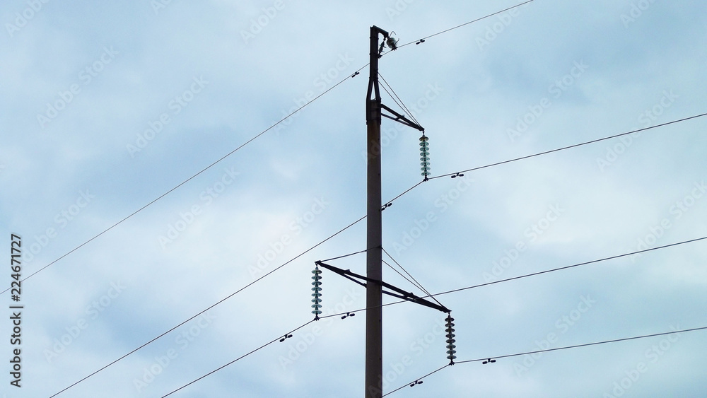 Electric poles and wires against the sky. Electric poles and wires against the sky.