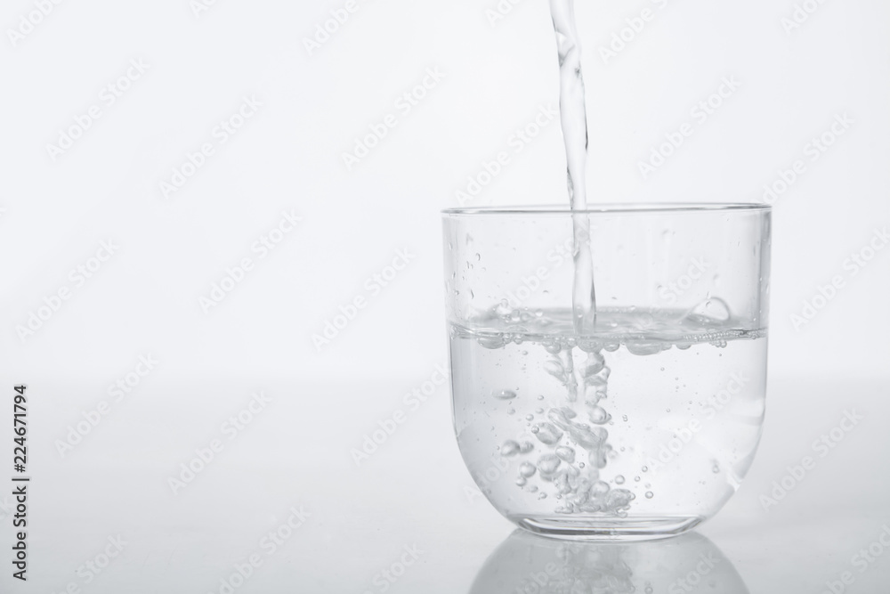 A pitcher and a glass. Pure water. A pitcher and a glass. Pure water.