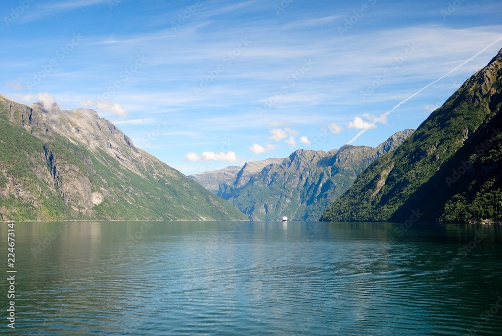 View of nearby mountains and waterfalls from the Geirangerfjord in Norway