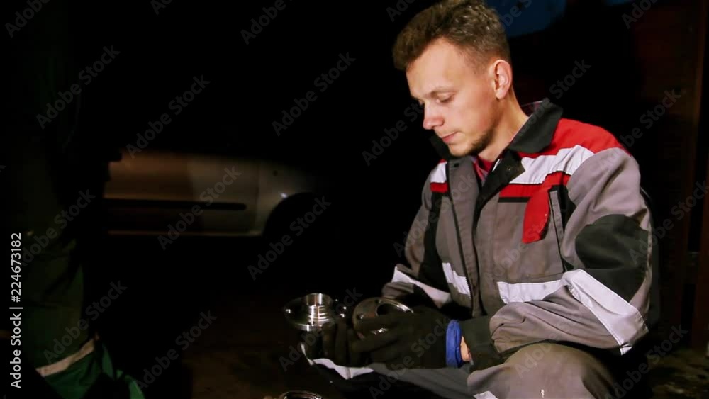 auto mechanic, specialist in car suspension repair. replacement of the wheel bearing. auto mechanic, specialist in car suspension repair. replacement of the wheel bearing.