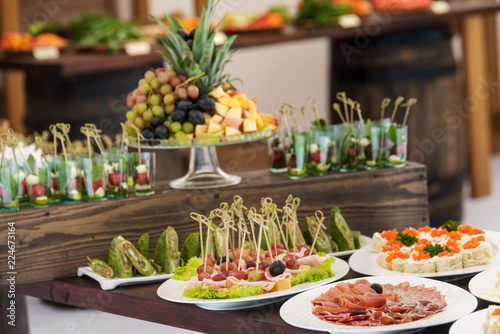 Snacks on served banquet table