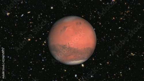 Planet Mars with Stars and Galaxies Spinning 