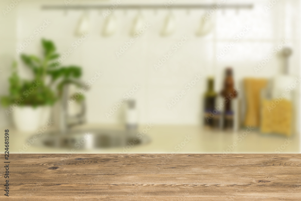 Wooden table top on blur interior background