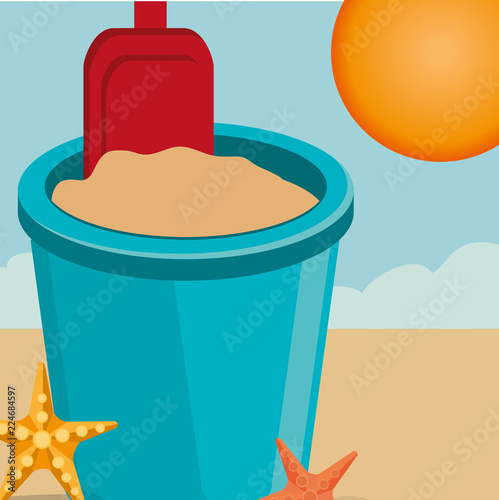 beach landscape with sand bucket scene