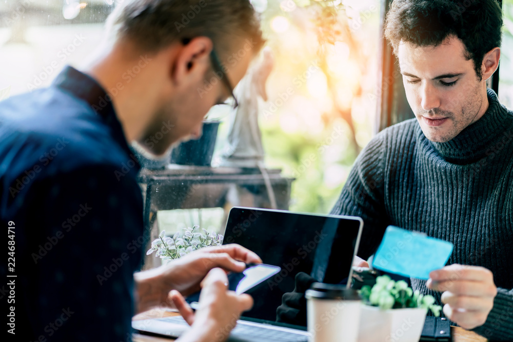 two smart caucasian man meeting and consult with serious and focusing conversation near window cafe background two smart caucasian man meeting and consult with serious and focusing conversation near window cafe background