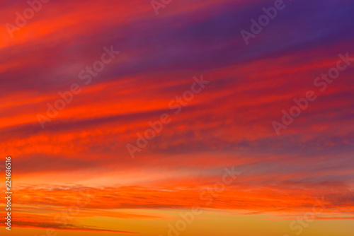 Sky with clouds in sunset time. Blurred background - sunset colors . © Inna
