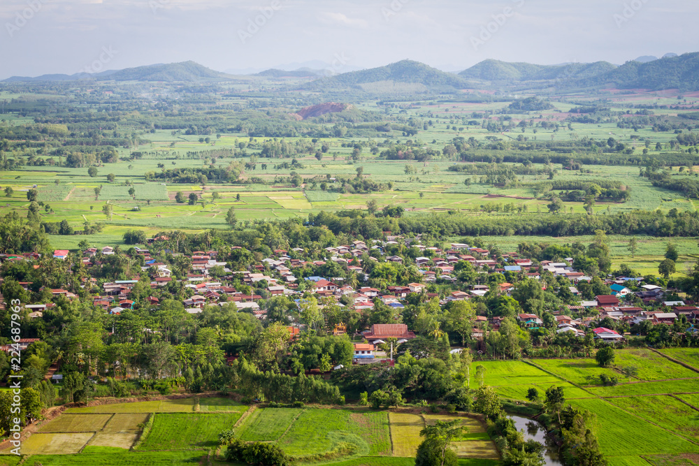 Landscape photo of rice and village in thailand