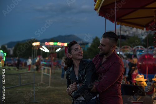 young cute  couple  amusement  park  © admirdervisevi