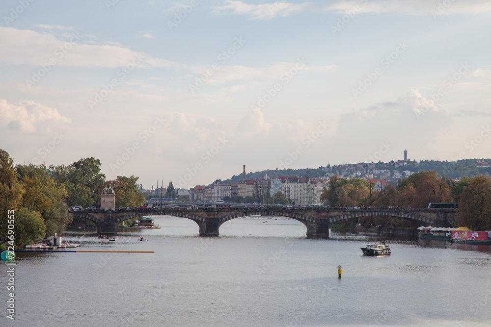 Fototapeta premium Charles Bridge historic bridge crosses the Vltava river in Prague, Czech Republic