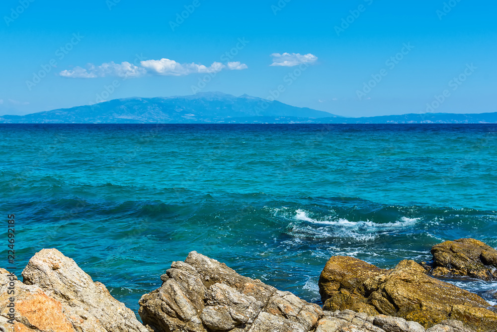 Naklejka premium Panoramic view of Aegean sea at Chalkidiki, Greece. Proti Ammoudia beach, one of the most beautiful beaches in the Aegean Sea.