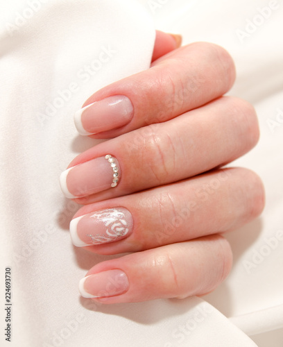  Woman s nails with beautiful french manicure fashion design