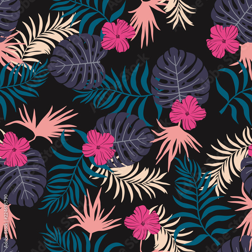 Tropical background with palm leavesand flowers. Seamless floral pattern. Summer vector illustration. Flat jungle print