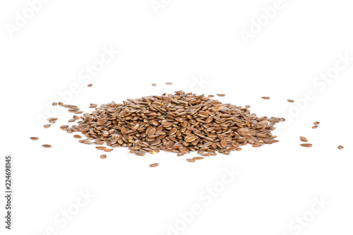 Fresh brown flaxseeds isolated on white