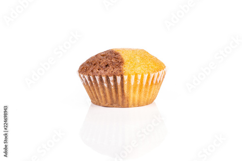 One whole tasty fresh baked marble muffin isolated on white background