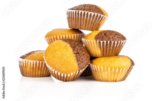 Group of six whole fresh baked marble muffin isolated on white background