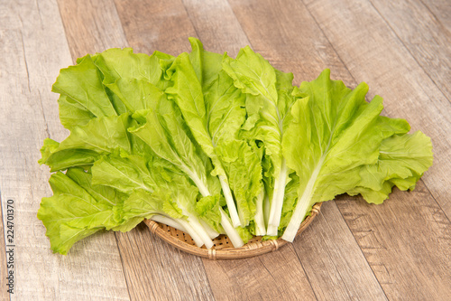 Lovely and healthy vagetables (Chinese cabbage or Bok-choy) in wooden background