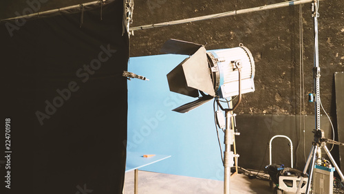 Blue screen backdrop and big LED studio light for movie video or film photography production and other equipment such as tripod  black screen backdrop  prop and any professional tools. 