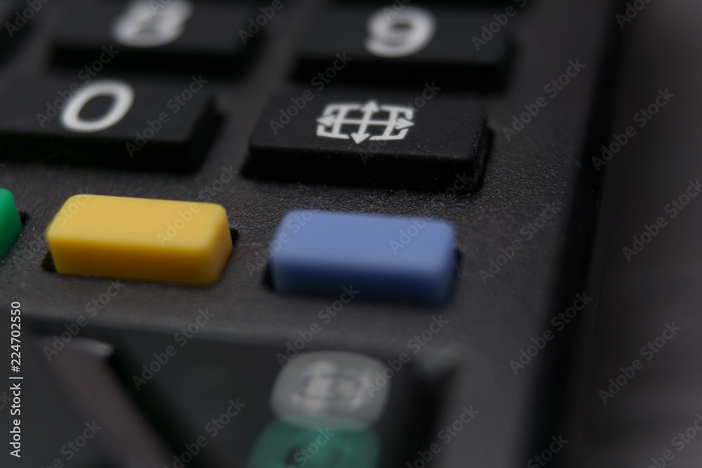 close up buttons of a remote control close up buttons of a remote control