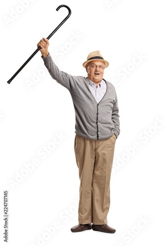Joyful senior with a cane