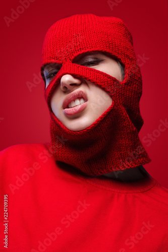 Displeased female in red mask