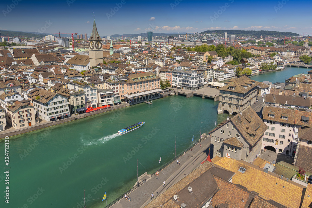 Aerial view of historic town centre of Zurich with the Muenster Bridge and Fraumuenster Church along Limmat river, Zurich, Switzerland.